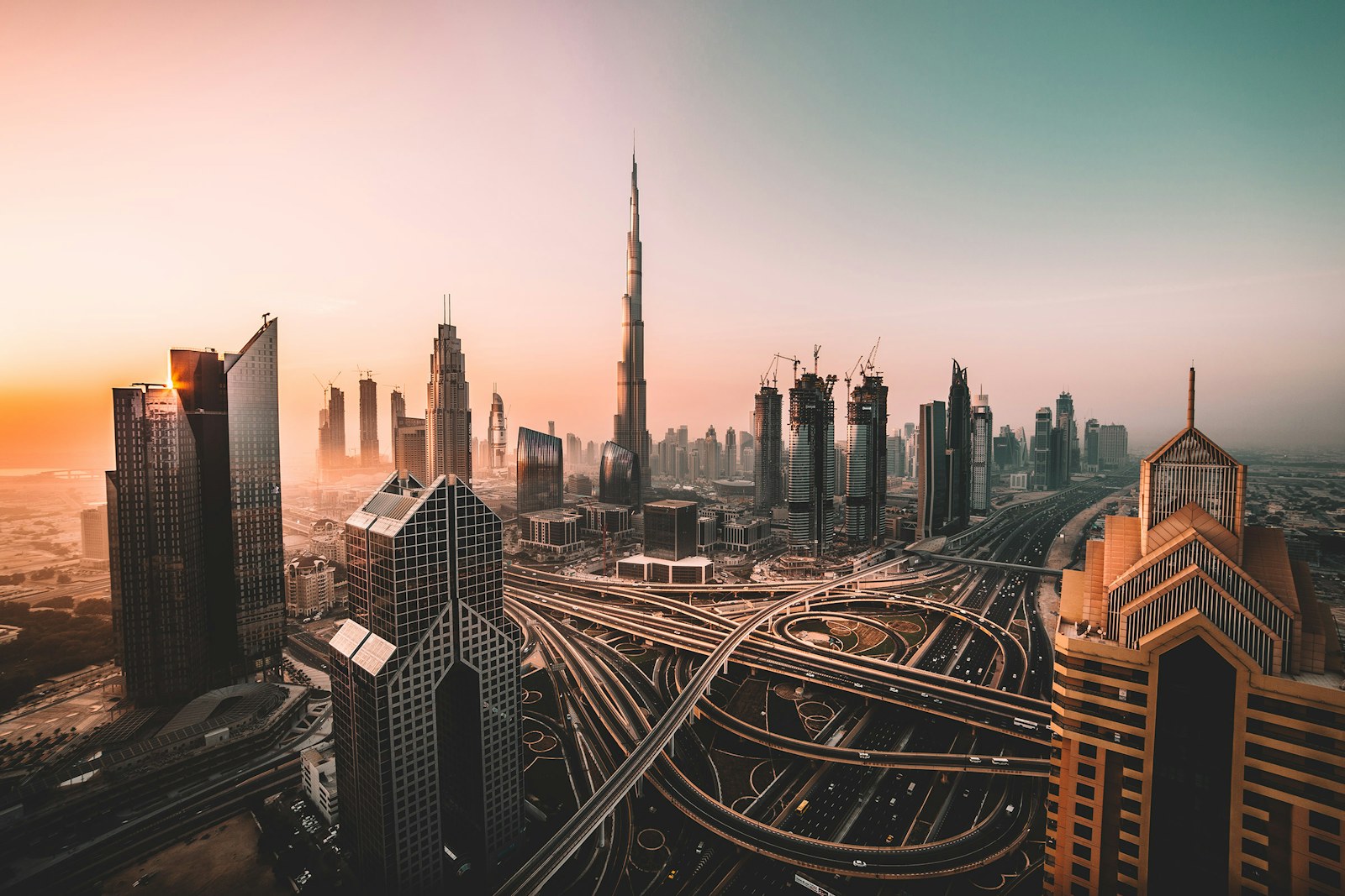Dubai skyline at sunset with the Burj Khalifa and Sheikh Zayed Road, social media marketing agency in Dubai